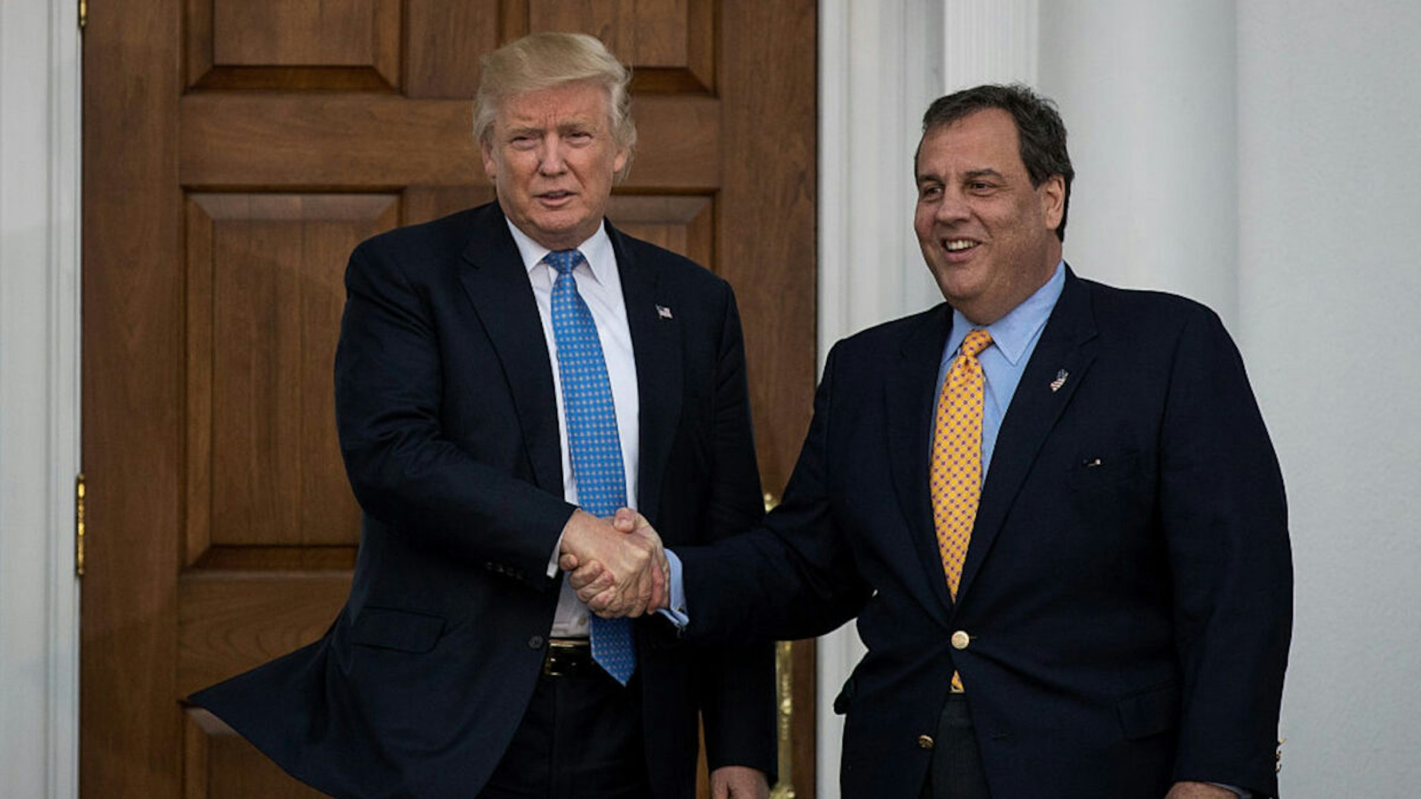 President-elect Donald Trump and New Jersey Governor Chris Christie shake hands before their meeting at Trump International Golf Club, November 20, 2016 in Bedminster Township, New Jersey.