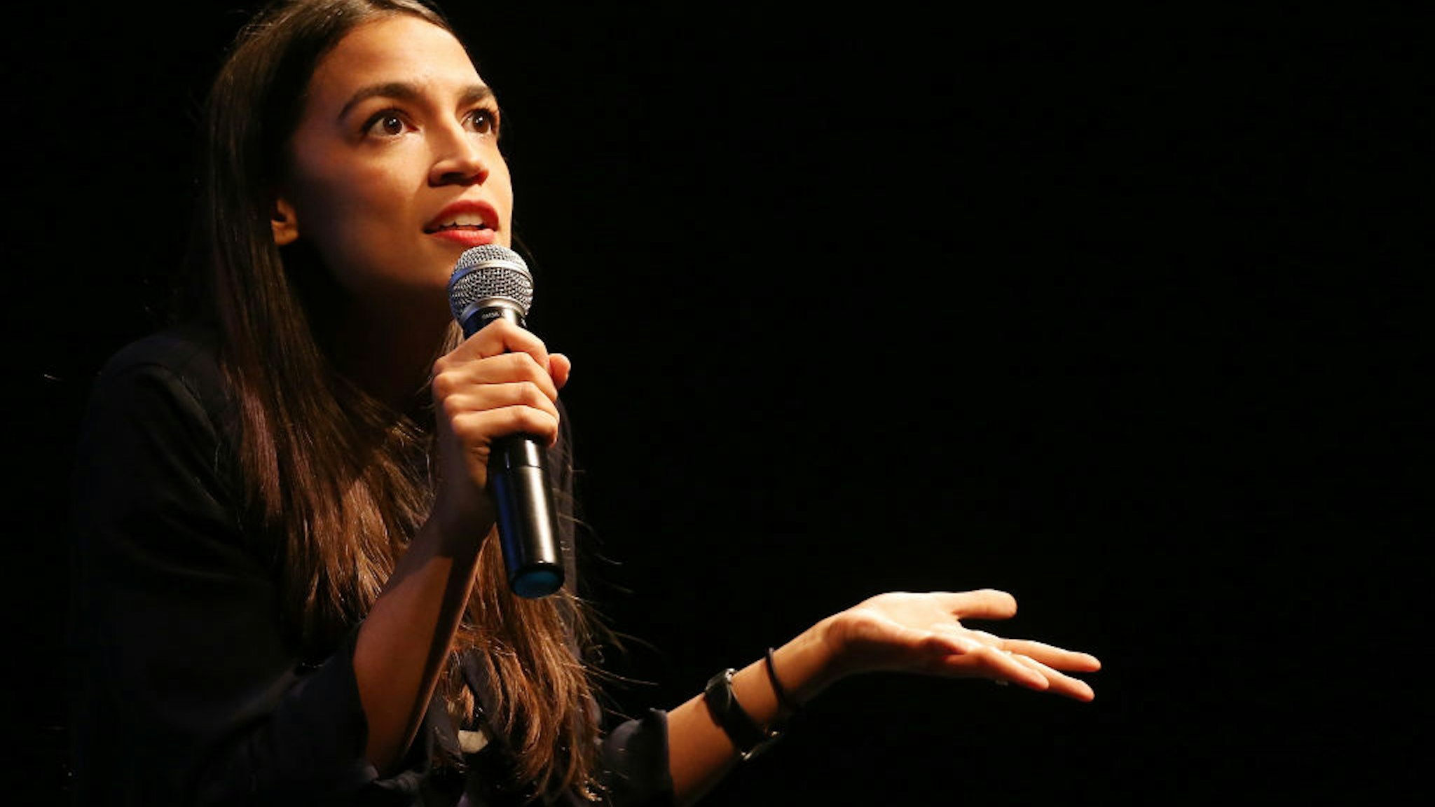 LOS ANGELES, CA - AUGUST 02: New York U.S. House candidate Alexandria Ocasio-Cortez speaks at a progressive fundraiser on August 2, 2018 in Los Angeles, California. The rising political star is on her third trip away from New York in three weeks and is projected to become the youngest woman elected to Congress this November when she will be 29 years old.