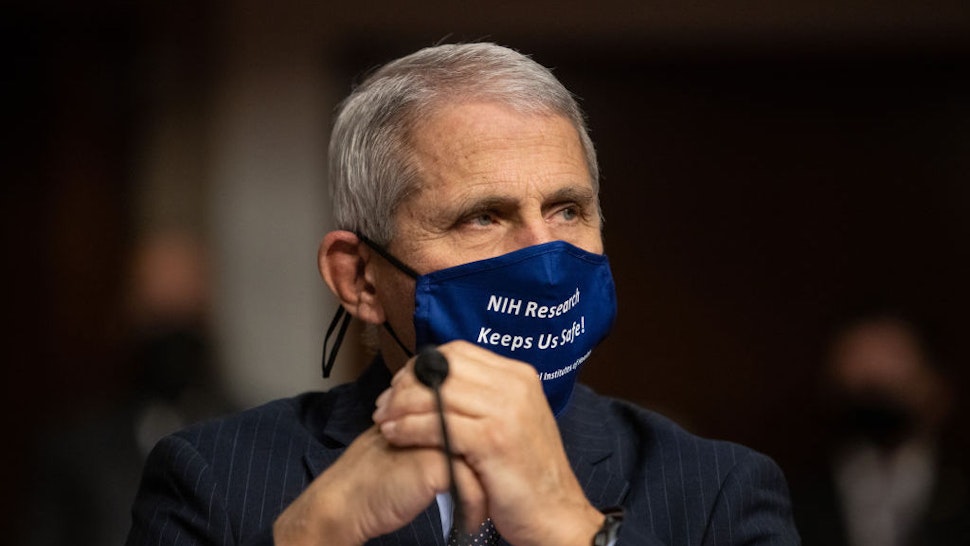 WASHINGTON, DC - SEPTEMBER 23: Anthony Fauci, director of National Institute of Allergy and Infectious Diseases at NIH, looks on before testifying at a Senate Health, Education, and Labor and Pensions Committee on Capitol Hill, on September 23, 2020 in Washington, DC. Dr. Fauci addressed the testing of vaccines and if they will be ready by the end of the year or early 2021. (Photo by Graeme Jennings- Pool/Getty Images)