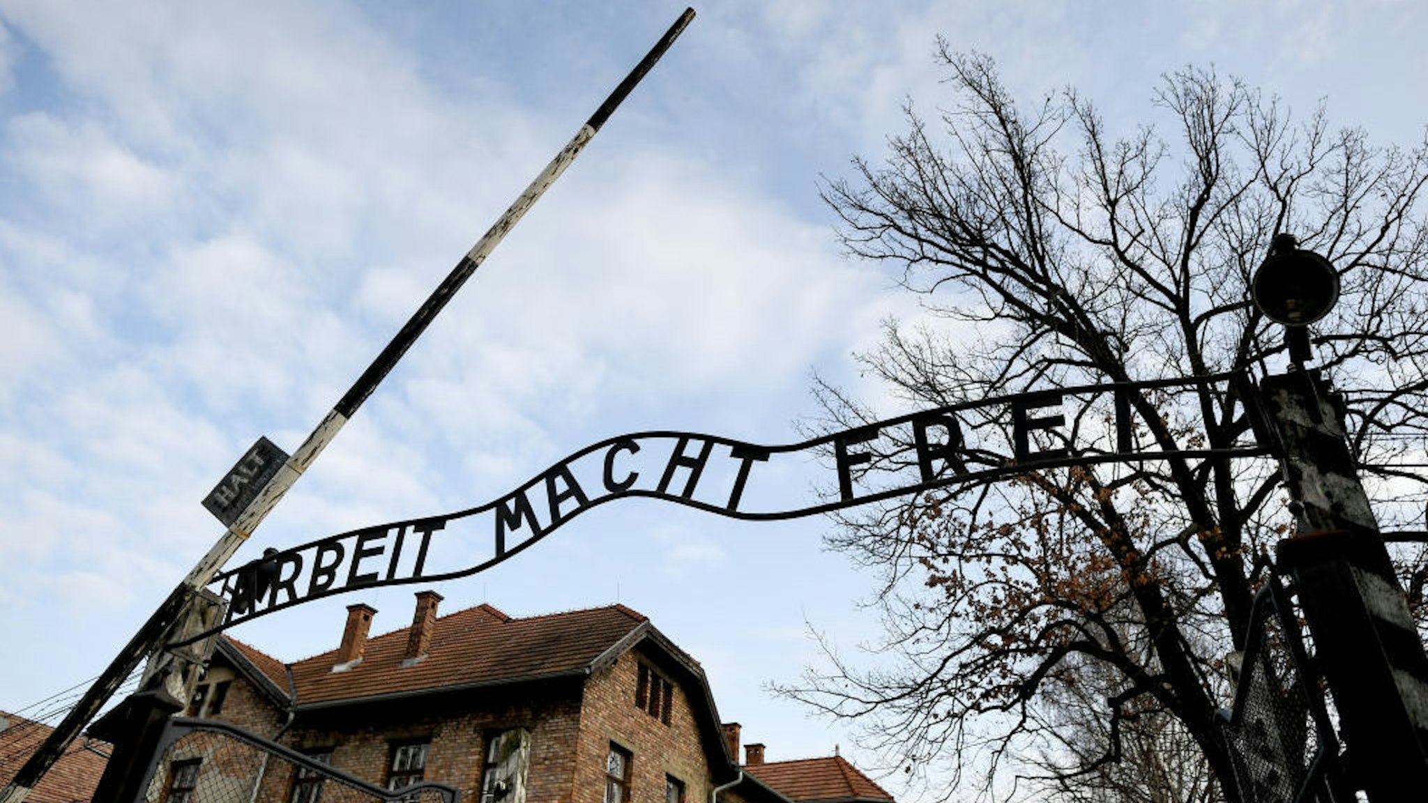 27 January 2020, Poland, Oswiecim: The gate with the lettering "Arbeit macht frei" on the edge of the commemoration of the 75th anniversary of the liberation of the former German concentration camp Auschwitz. Photo: Britta Pedersen/dpa-Zentralbild/ZB (Photo by Britta Pedersen/picture alliance via Getty Images)