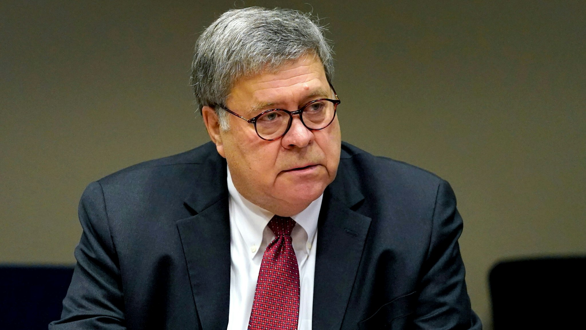 US Attorney General William Barr, left, meets with members of the St. Louis Police Department, October 15, 2020, in St. Louis, Missouri. - The officers are among several in the department who have been shot in the line of duty this year.