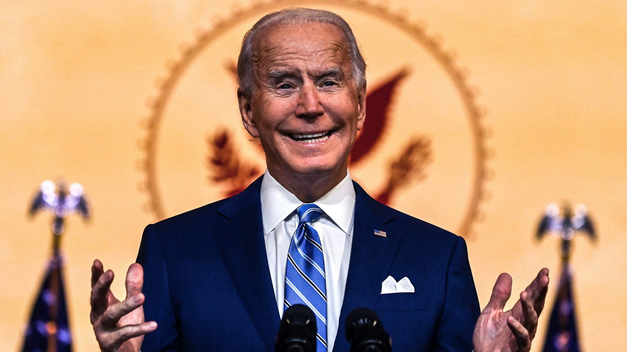 US President-elect Joe Biden delivers a Thanksgiving address at the Queen Theatre in Wilmington, Delaware, on November 25, 2020. - Biden called for an end to the "grim season of division" in the holiday speech . "I believe that this grim season of division, demonization is going to give way to a year of light," Biden said.