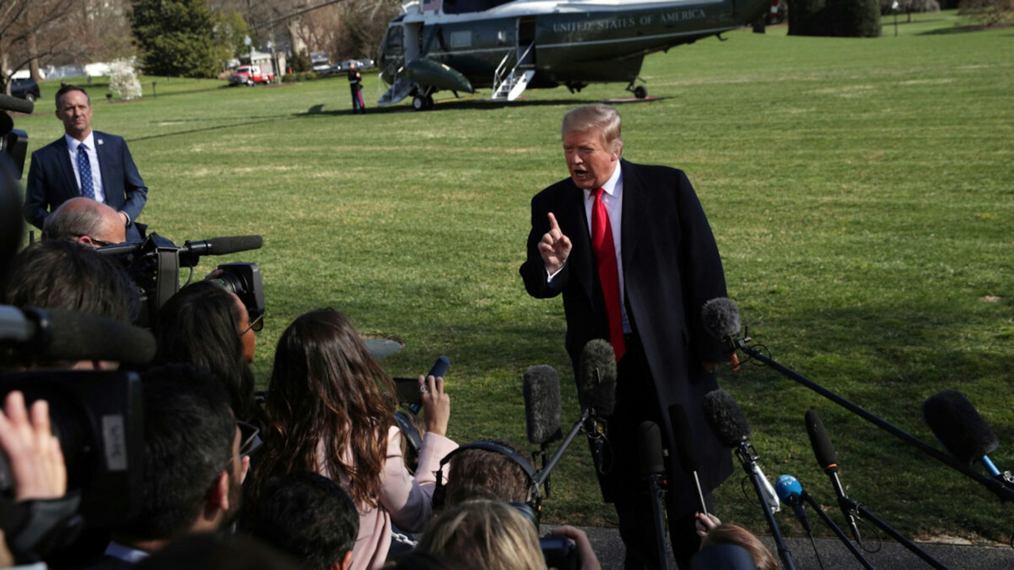 U.S. President Donald Trump speaks to members of the media on the South Lawn prior to his departure from the White House March 28, 2019 in Washington, DC.