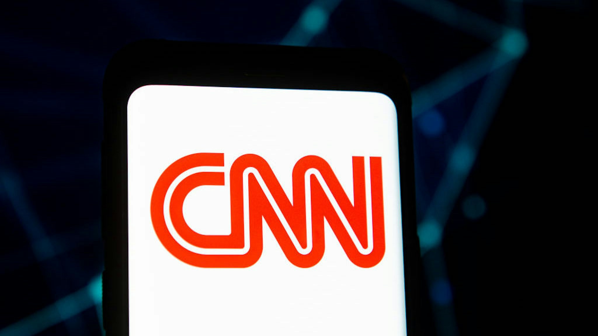 POLAND - 2020/03/23: In this photo illustration a CNN logo seen displayed on a smartphone. (Photo Illustration by Mateusz Slodkowski/SOPA Images/LightRocket via Getty Images)