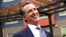California Gubernatorial Candidate Gavin Newsom Tours Low-Income Apartment Complex With SF Mayor London Breed SAN FRANCISCO, CA - AUGUST 22: California Lt. Gov. and California gubernatorial candidate Gavin Newsom (L) laughs with a resident as he visits the Alice Griffith Apartments on August 22, 2018 in San Francisco, California. Lt. Gov. Gavin Newsom and San Francisco mayor London Breed toured a low-income housing complex. Newsom leads Republican gubernatorial candidate John Cox by an average of 23 percentage points in recent polls.