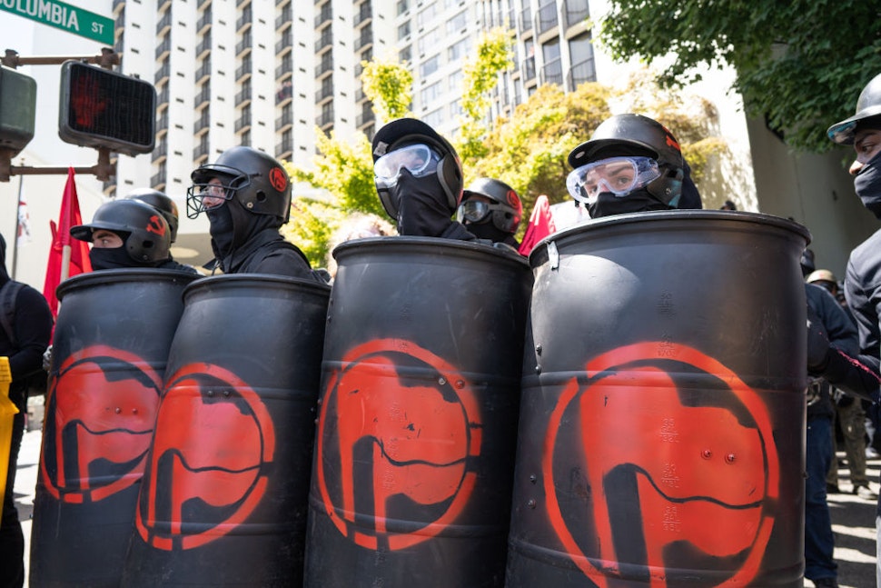 DOWNTOWN, PORTLAND, OREGON, UNITED STATES - 2018/08/04: Members of Antifa watch police and far right protesters during the Patriot Prayer Rally.