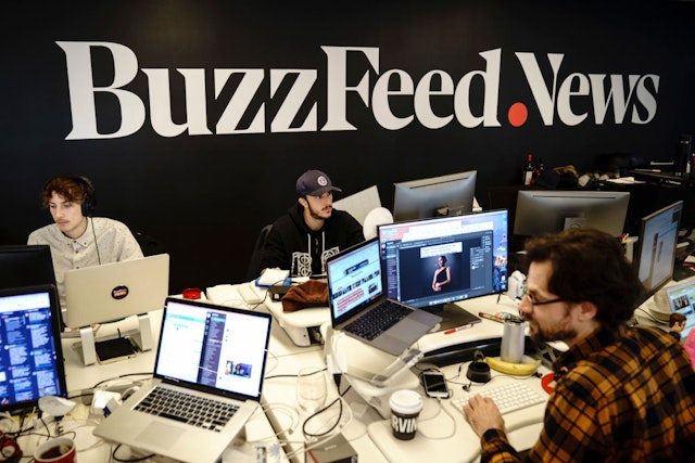NEW YORK, NY - DECEMBER 11: Members of the BuzzFeed News team work at their desks at BuzzFeed headquarters, December 11, 2018 in New York City. BuzzFeed is an American internet media and news company that was founded in 2006. According to a recent report in The New York Times, the company expects to surpass 300 million dollars in earnings for the 2018 fiscal year. (Photo by Drew Angerer/Getty Images)