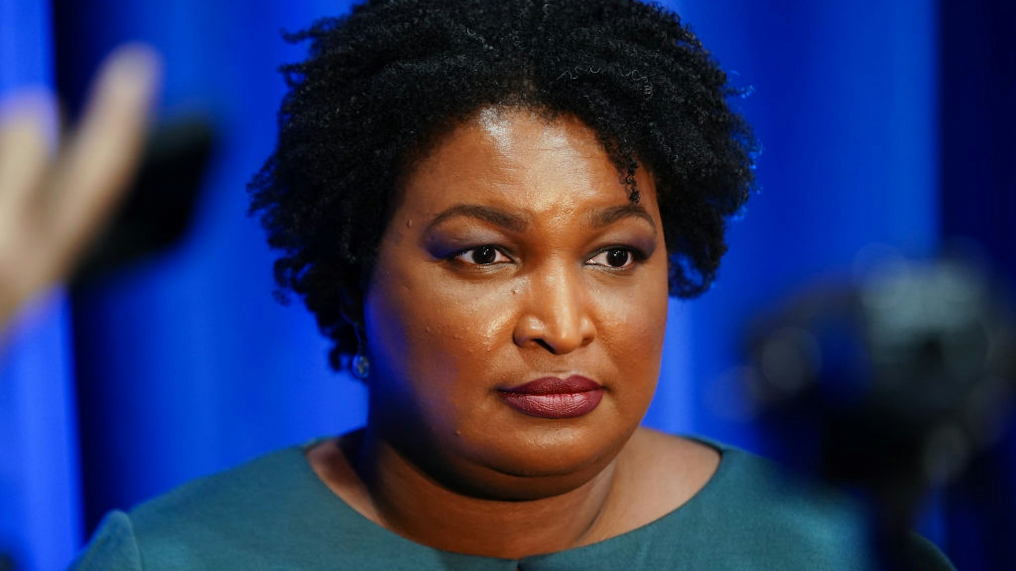 Stacey Abrams, former state Representative from Georgia, listens to questions from members of the media ahead of the Democratic presidential debate in Atlanta, Georgia, U.S., on Wednesday, Nov. 20, 2019.