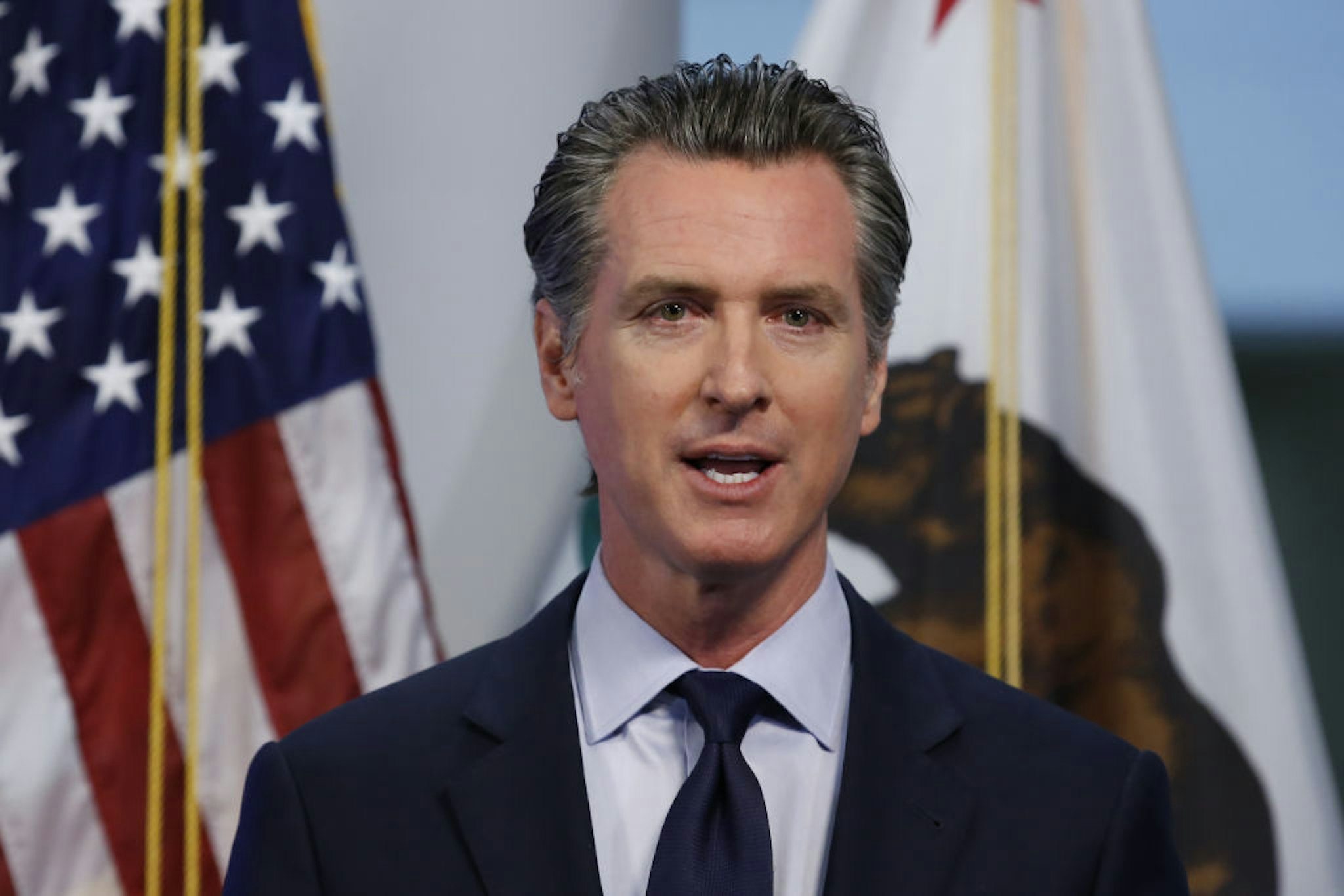 Gavin Newsom, governor of California, speaks during a news conference in Sacramento, California, U.S., on Tuesday, April 14, 2020.