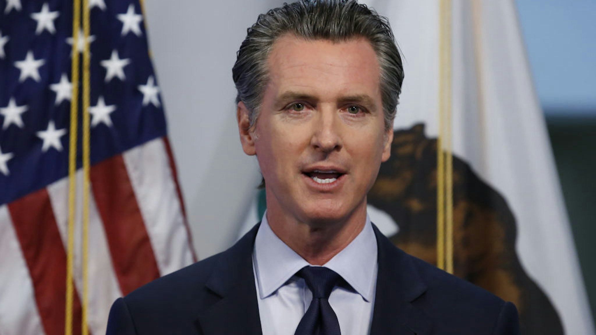 Gavin Newsom, governor of California, speaks during a news conference in Sacramento, California, U.S., on Tuesday, April 14, 2020.