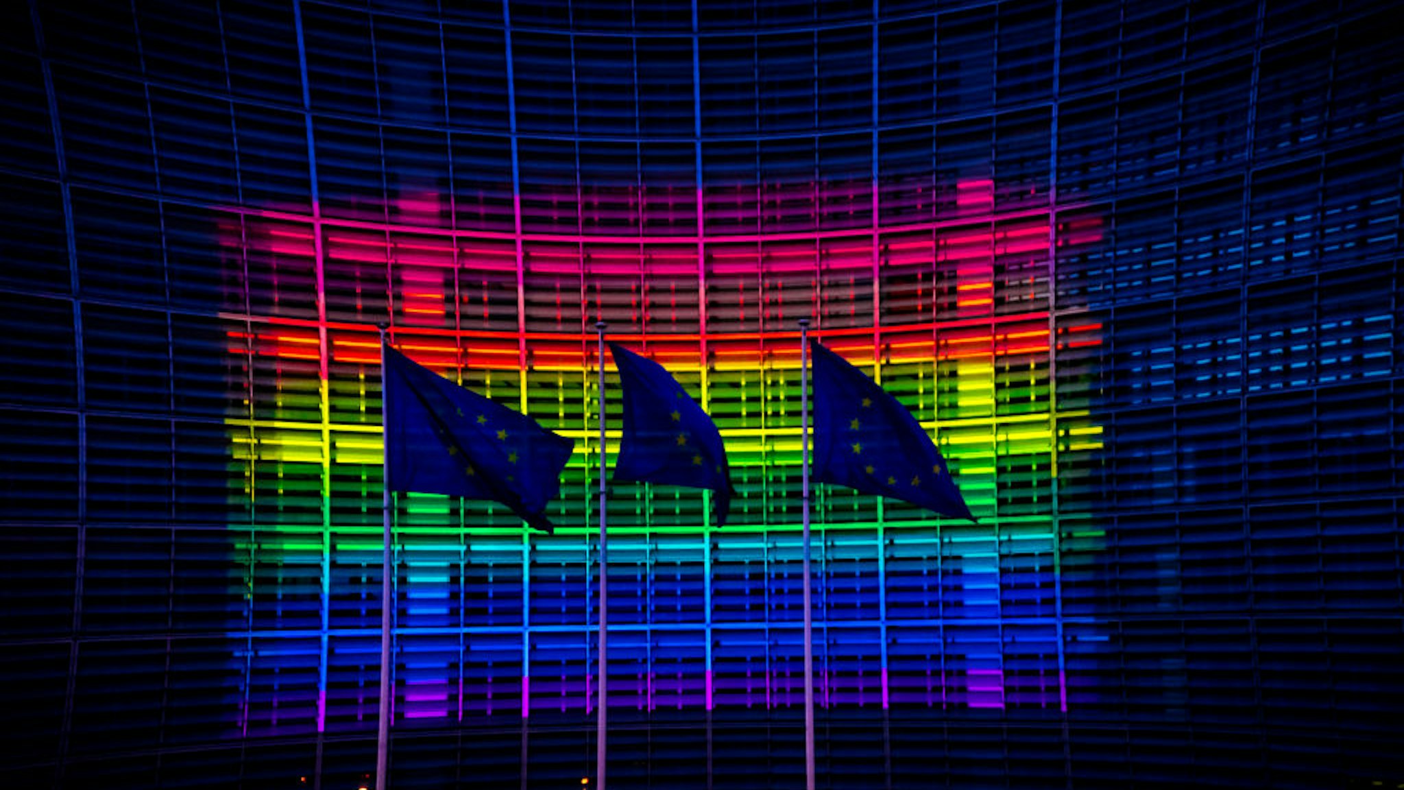 European Commission headquarters lit up in the colours of the rainbow flag to support International Day Against LGBT in Brussels, Belgium on May 16, 2020.
