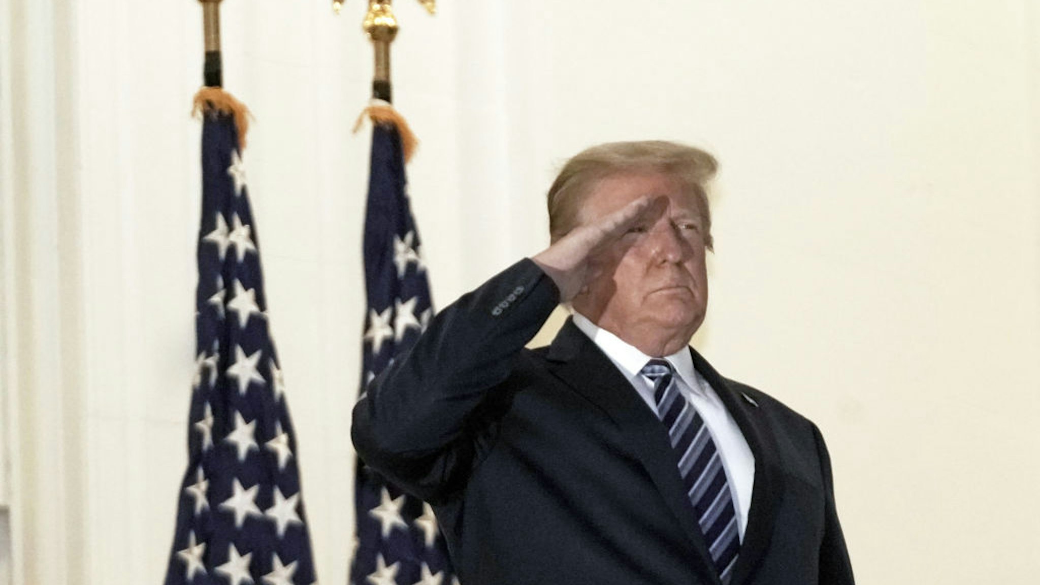 Trump saluting