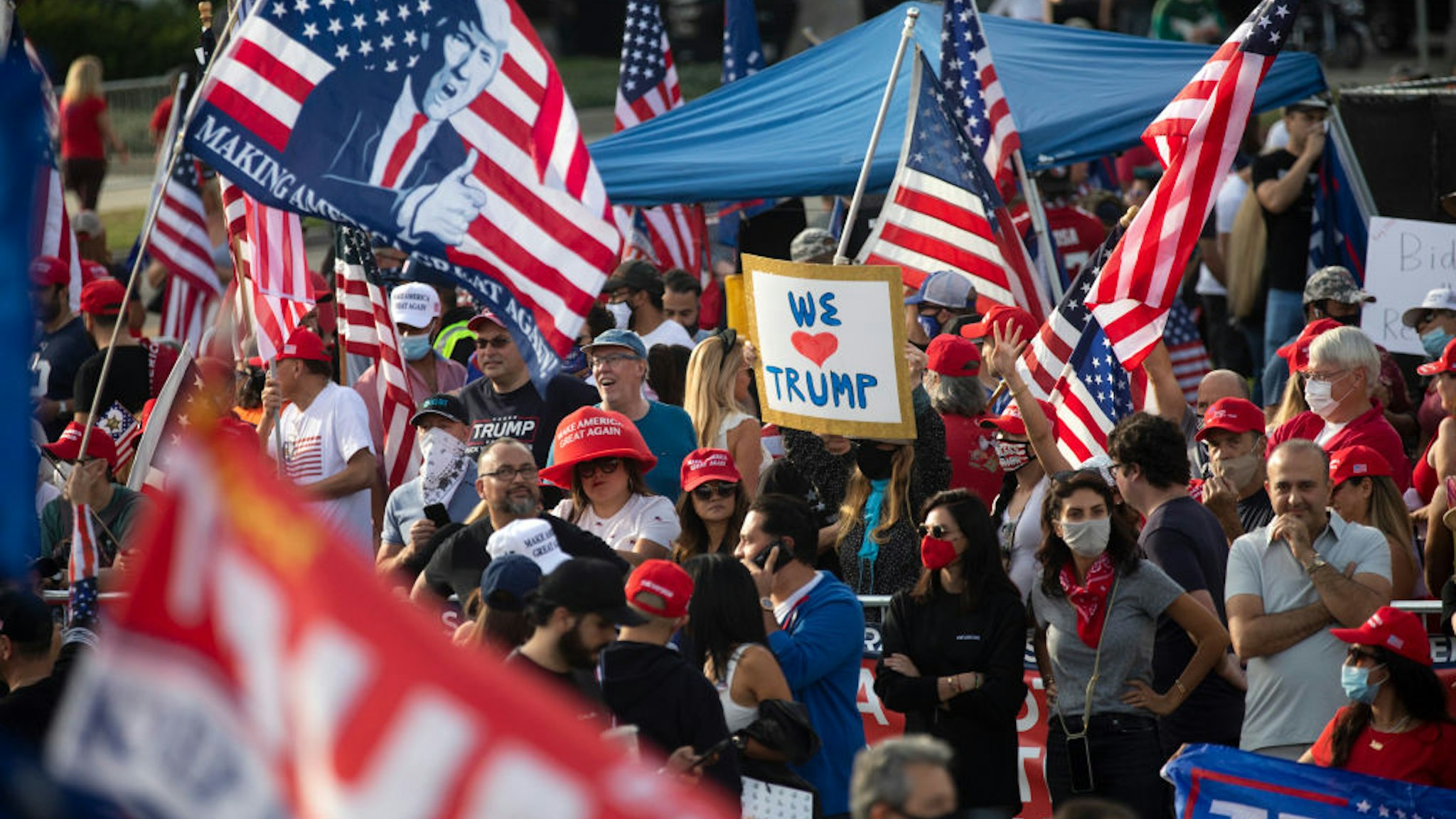 A large crowd chants four more years during a Pro Trump rally on Santa America Blvd and Beverly Blvd in Beverly Hills days before the Presidential election. on Saturday, Oct. 31, 2020.
