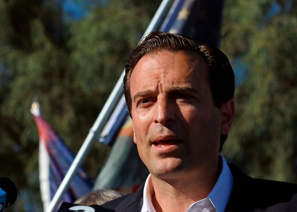Former Nevada Attorney General Adam Laxalt speaks to the news media during a press conference by members of Donald J. Trump for President, Inc., outside Clark County Election Department on November 5, 2020, in North Las Vegas.