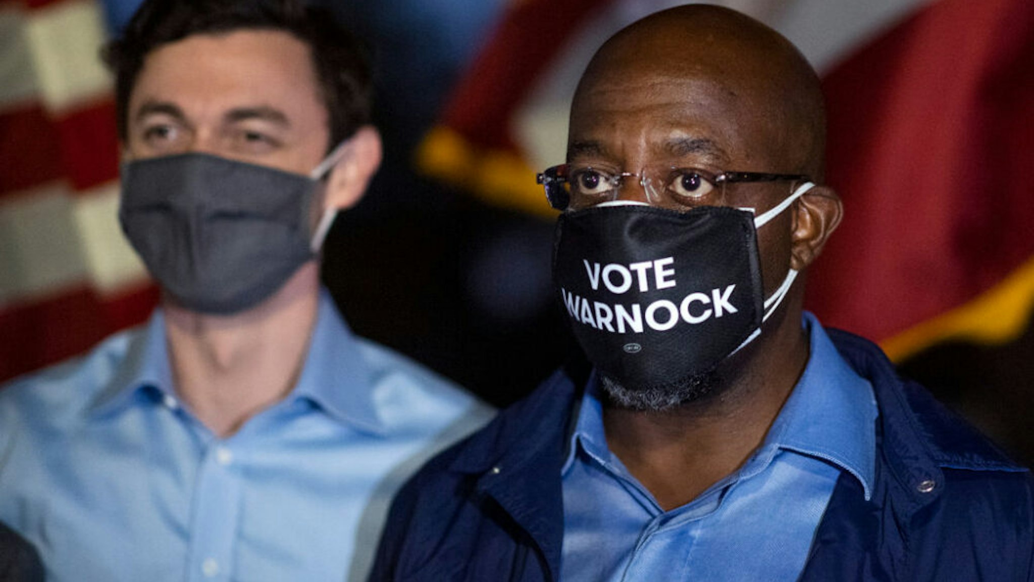 UNITED STATES - OCTOBER 29 (FILE): Democratic candidates for Georgia senate Rev. Raphael Warnock, right, and Jon Ossoff, attend a drive-in rally with Muscogee County Democrats at the Civic Center in Columbus, Ga., on Thursday, October 29, 2020.