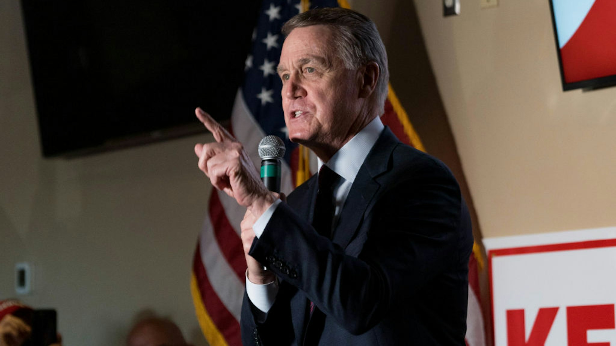 U.S. Sen David Perdue (R-GA) speaks at a campaign event to supporters at a restaurant on November 13, 2020 in Cumming, Georgia.
