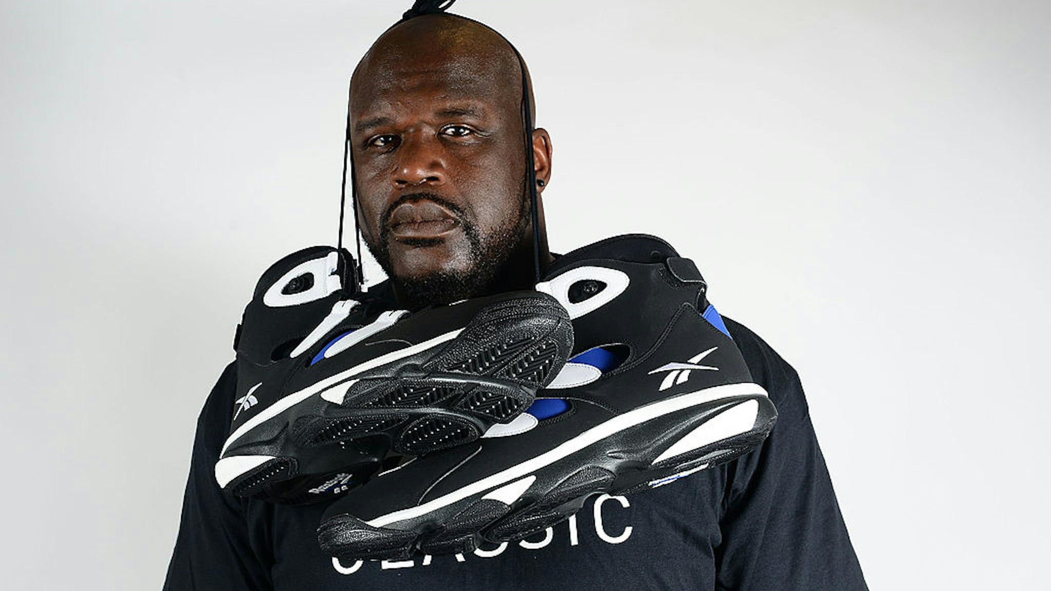 PHILADELPHIA, PA - JULY 09: Former NBA basketball player Shaquille O'Neal poses with Reebok sneakers at the Reebok Classic Breakout at Philadelphia University on July 9, 2014 in Philadelphia, Pennsylvania. (Photo by Lisa Lake/Getty Images for Reebok)