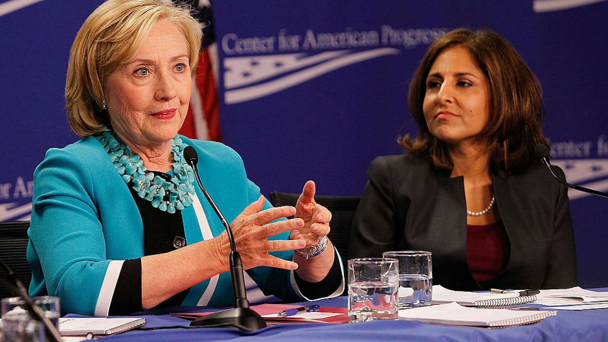 Secretary Hillary Clinton (L) and CAP President Neera Tanden attend the "Why Women's Economic Security Matters For All" panel discussion at The Center For American Progress on September 18, 2014 in Washington, DC.