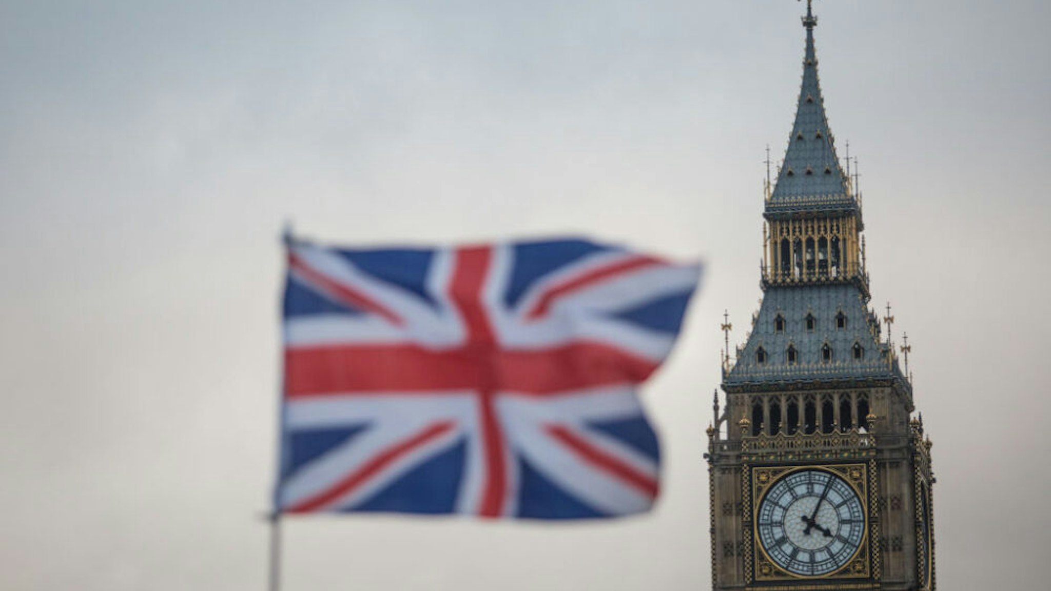 LONDON, ENGLAND - FEBRUARY 01: A Union Jack flag flutters in front of the Elizabeth Tower, commonly known as Big Ben on February 1, 2017 in London, England. The European Union (notification of withdrawal) bill that will trigger article 50 is being debated by MPs over two days. The vote will take place on tomorrow evening. Labour MPs are subject to a three-line whip after Jeremy Corbyn urged his party to vote for Article 50.