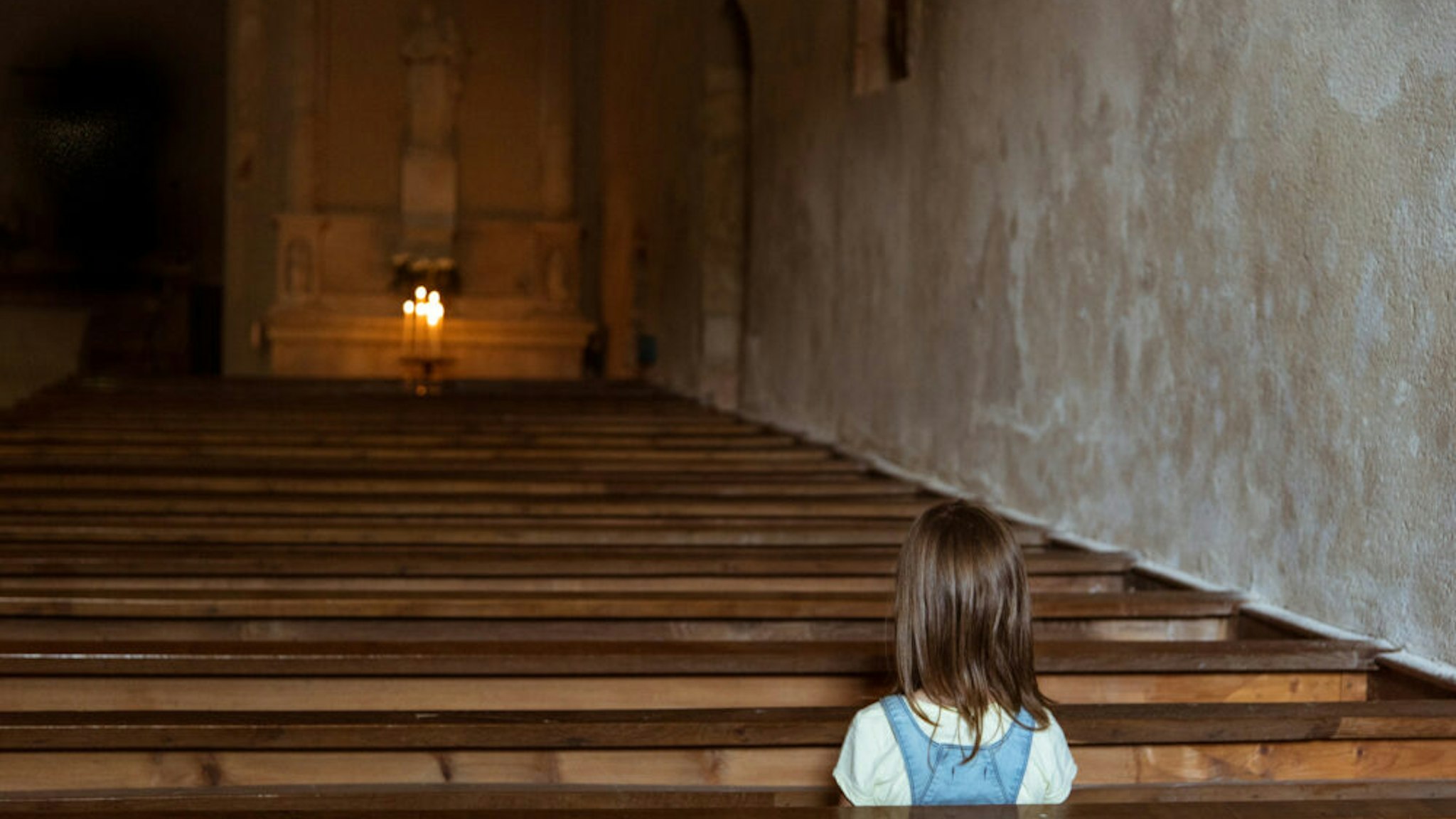 Girl Sitting In Church