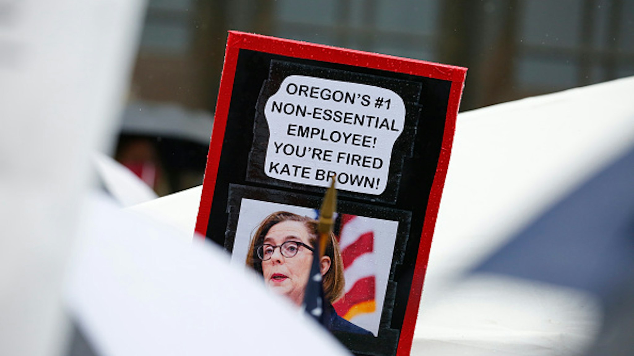 SALEM, OR - MAY 02: A sign criticizing Oregon Governor Kate Brown is seen at the ReOpen Oregon Rally on May 2, 2020 in Salem, Oregon. Demonstrators gathered at the state capitol to demand a reopening of the state and to protest Gov. Kate Brown's stay-at-home order which was put in place to slow the spread of the coronavirus