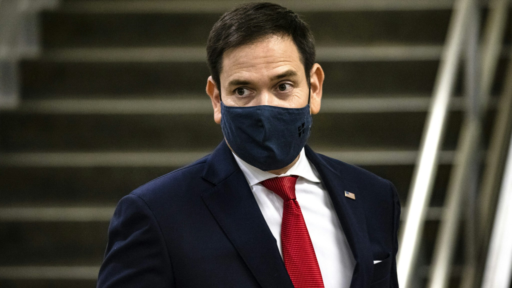 WASHINGTON, DC - NOVEMBER 12: Senator Marco Rubio (R-FL) walks through the Senate subway following a vote in the Senate at the U.S. Capitol on November 12, 2020 in Washington, DC. As President Trump continues to refuse to concede the Presidential Election to President-elect Joe Biden more Congressmen and women call for Biden to begin to receive classified national intelligence briefings from the Tump administration.