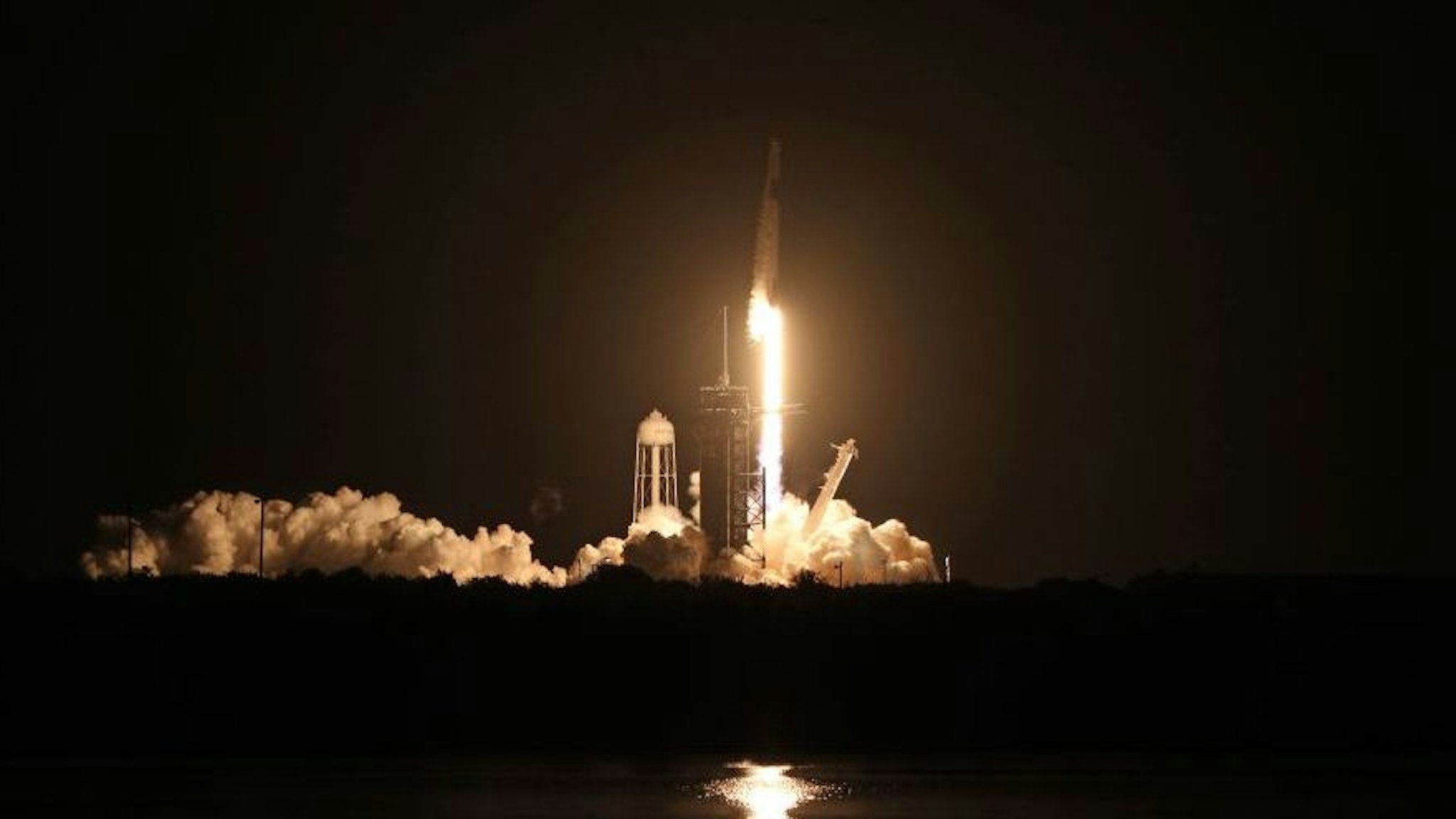 A SpaceX Falcon 9 rocket lifts off from launch complex 39A at the Kennedy Space Center in Florida on November 15, 2020. - NASA's SpaceX Crew-1 mission is the first crew rotation mission of the SpaceX Crew Dragon spacecraft and Falcon 9 rocket to the International Space Station as part of the agencys Commercial Crew Program. NASA astronauts Mike Hopkins, Victor Glover, and Shannon Walker, and astronaut Soichi Noguchi of the Japan Aerospace Exploration Agency (JAXA) are scheduled to launch at 7:27 p.m. EST on November 15, from Launch Complex 39A at the Kennedy Space Center. (Photo by Gregg Newton / AFP)