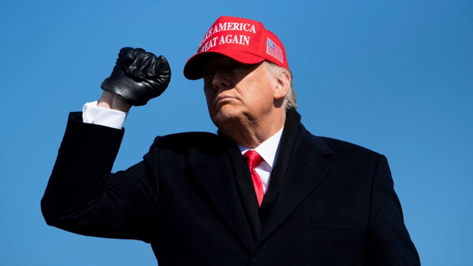 TOPSHOT-US-VOTE-TRUMP-NORTH CAROLINA TOPSHOT - US President Donald Trump leaves after speaking during a Make America Great Again rally at Fayetteville Regional Airport November 2, 2020, in Fayetteville, North Carolina. - The US presidential campaign enters its final day Monday with a last-minute scramble for votes by Donald Trump and Joe Biden, drawing to a close an extraordinary race that has put a pandemic-stricken country on edge.