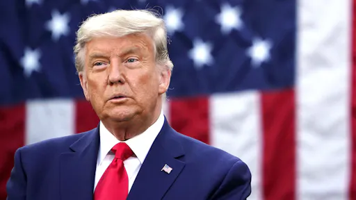 US-POLITICS-HEALTH-VIRUS-TRUMP US President Donald Trump looks on after delivering an update on "Operation Warp Speed" in the Rose Garden of the White House in Washington, DC on November 13, 2020.