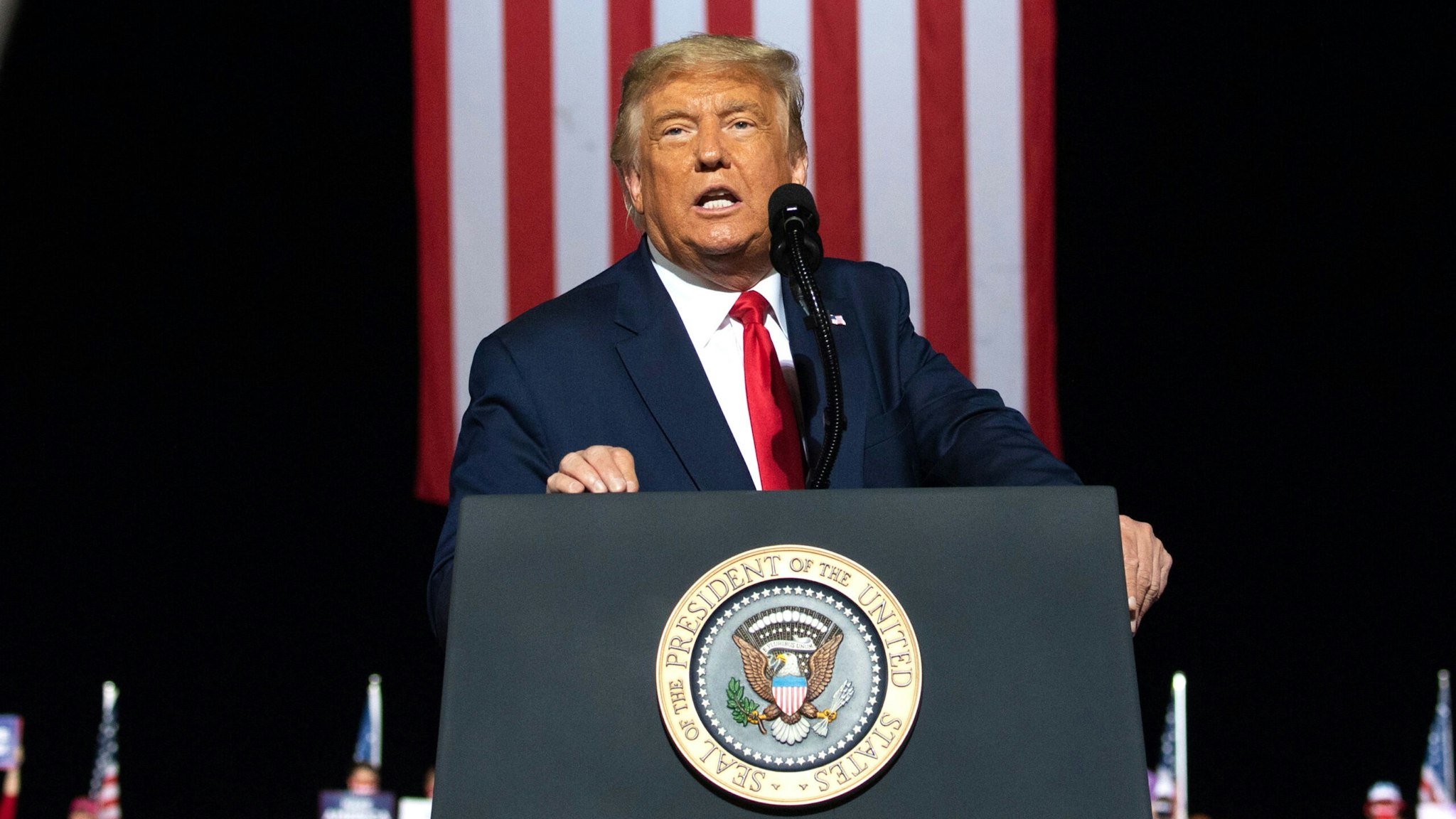 US President Donald Trump addresses supporters during a Make America Great Again rally as he campaigns in Gastonia, North Carolina, October 21, 2020.