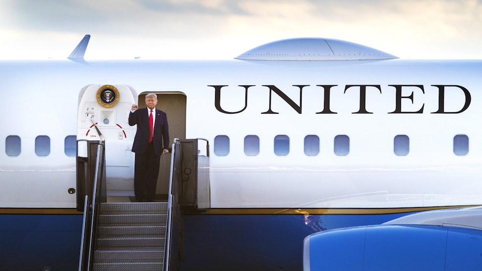 Bloomberg Best Of U.S. President Donald Trump 2017 - 2020: U.S. President Donald Trump gestures while disembarking Air Force One ahead of a campaign rally at the Pro Star Aviation hangar in Londonderry, New Hampshire, U.S., on Friday, Aug. 28, 2020. Our editors select the best archive images looking back at Trumps 4 year term from 2017 - 2020.