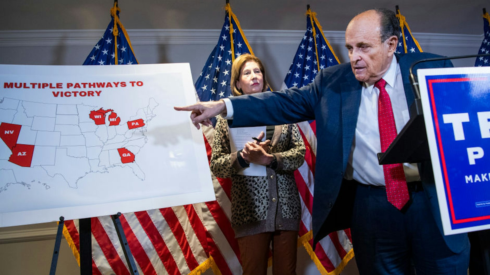 Rudolph Giuliani, attorney for President Donald Trump, conducts a news conference at the Republican National Committee on lawsuits regarding the outcome of the 2020 presidential election on Thursday, November 19, 2020.Trump attorney Sydney Powell, also appears. (Photo By Tom Williams/CQ Roll Call)