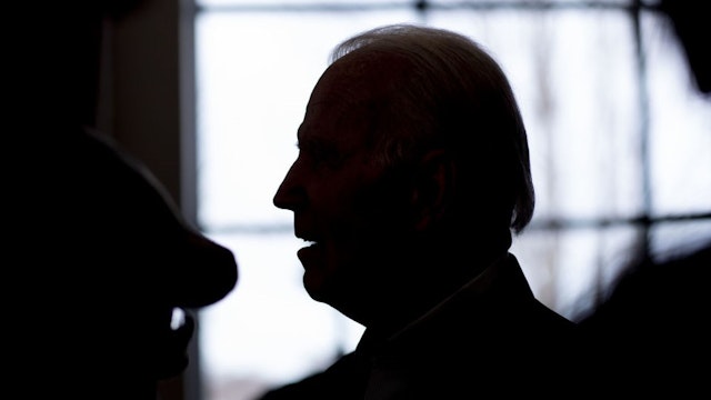 The silhouette of former U.S. Vice President Joe Biden, 2020 Democratic presidential candidate, is seen greeting attendees during a campaign event in Dubuque, Iowa, U.S., on Sunday, Feb. 2, 2020. Biden is opening a daunting lead over the rest of the field in the March 3 Texas primary, but his advantage has slipped in South Carolina, where the primary later this month is crucial for his campaign. Photographer: