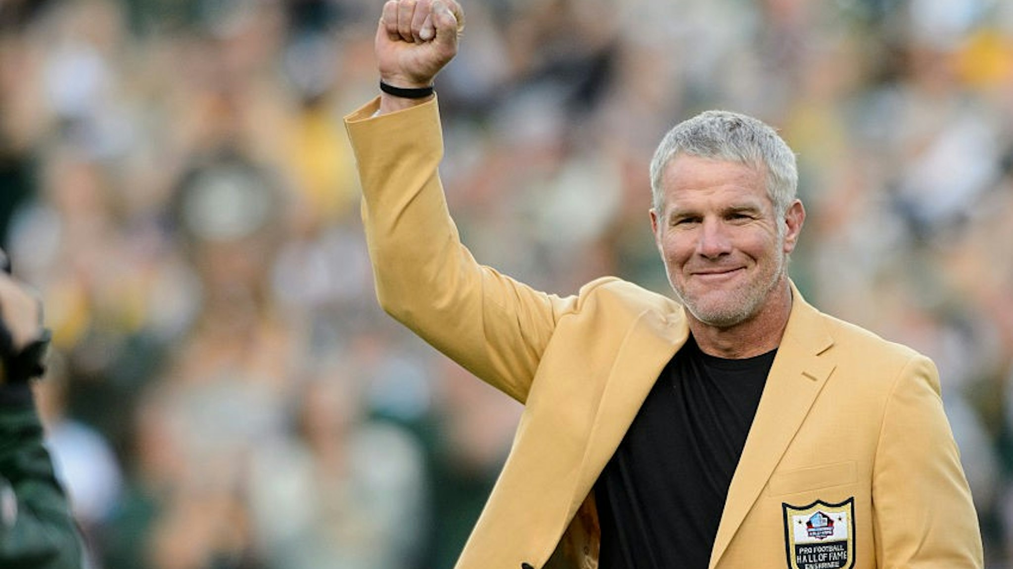 GREEN BAY, WI - OCTOBER 16: Former NFL quarterback Brett Farve looks on as he is inducted into the Ring of Honor during a halftime ceremony during the game between the Green Bay Packers and the Dallas Cowboys on October 16, 2016 at Lambeau Field in Green Bay, Wisconsin. The Cowboys defeated the Packers 30-16. (Photo by