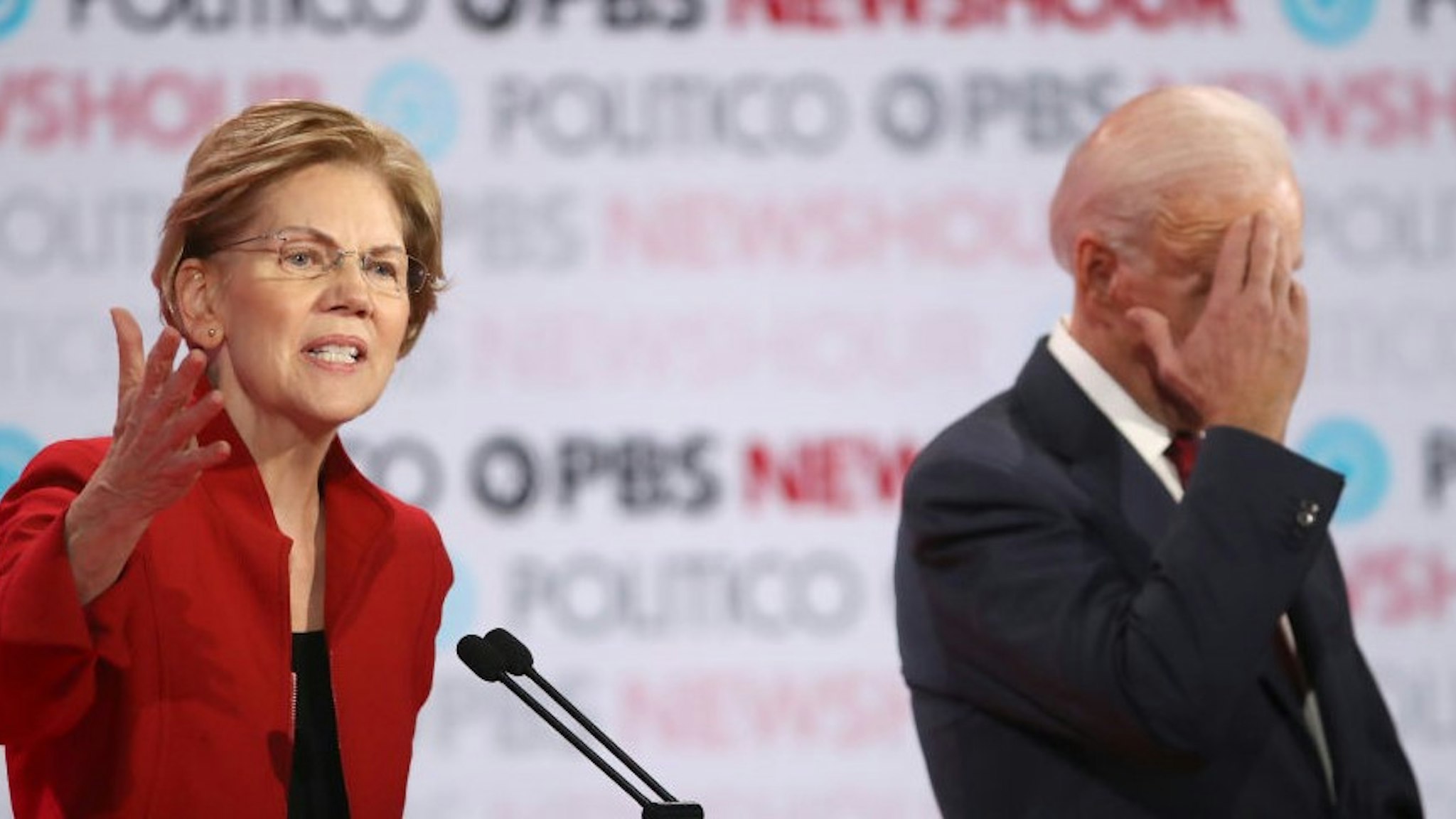 LOS ANGELES, CALIFORNIA - DECEMBER 19: Sen. Elizabeth Warren (D-MA) speaks as former Vice President Joe Biden listens during the Democratic presidential primary debate at Loyola Marymount University on December 19, 2019 in Los Angeles, California. Seven candidates out of the crowded field qualified for the 6th and last Democratic presidential primary debate of 2019 hosted by PBS NewsHour and Politico. (Photo by