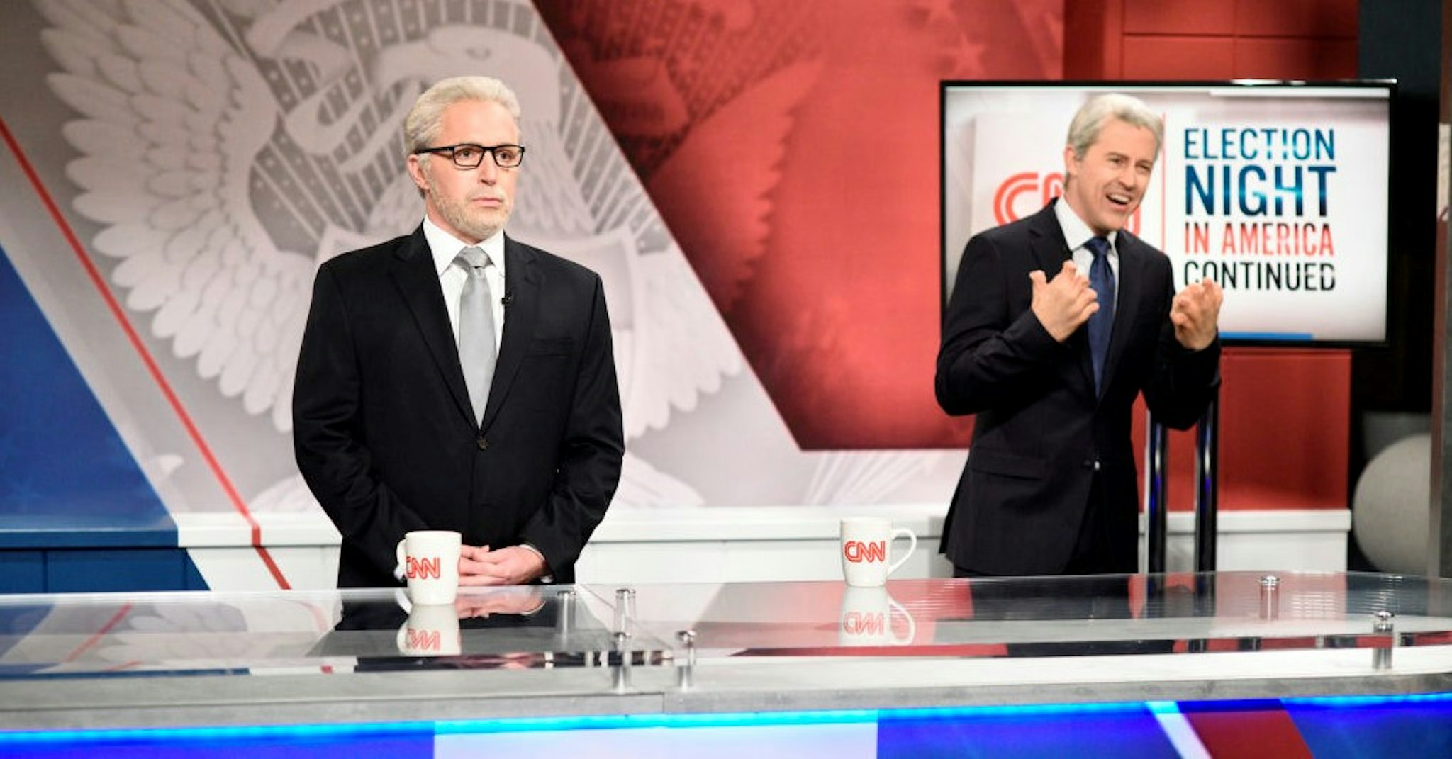 SATURDAY NIGHT LIVE -- "Dave Chappelle" Episode 1791 -- Pictured: (l-r) Beck Bennett as Wolf Blitzer and Alex Moffat as John King during the "Biden Victory" Cold Open on Saturday, November 7, 2020 -- (Photo By: