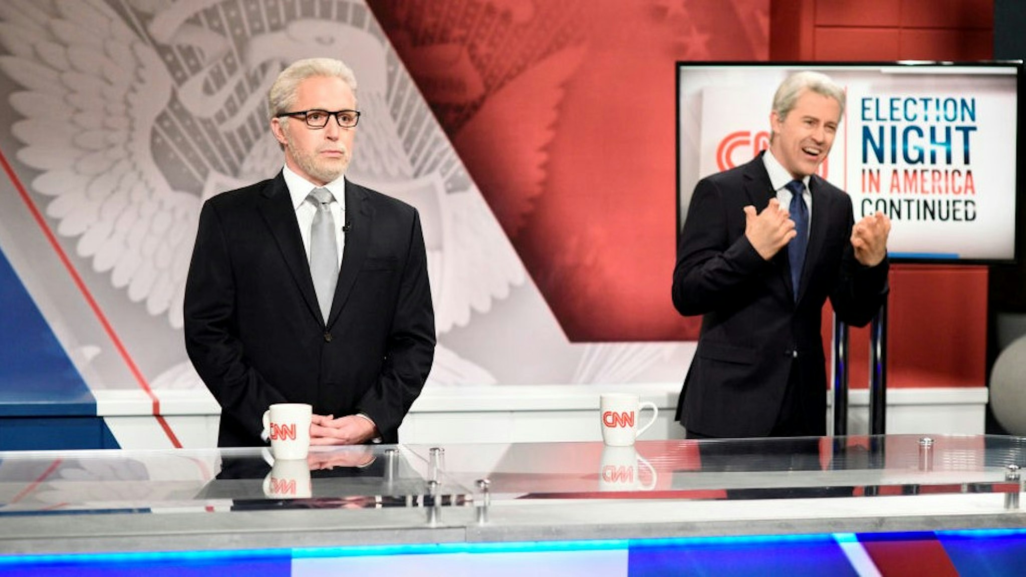 SATURDAY NIGHT LIVE -- "Dave Chappelle" Episode 1791 -- Pictured: (l-r) Beck Bennett as Wolf Blitzer and Alex Moffat as John King during the "Biden Victory" Cold Open on Saturday, November 7, 2020 -- (Photo By: