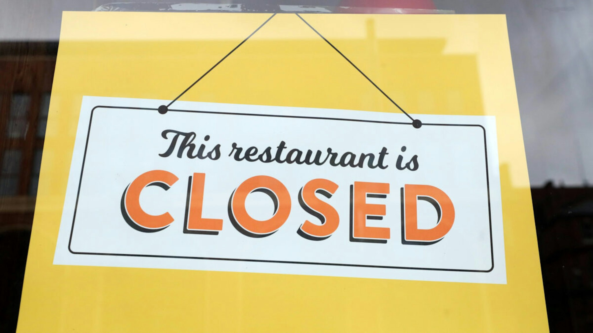 Close up view of a sign saying this restaurant is closed on May 11, 2020 in Aylesbury, England.