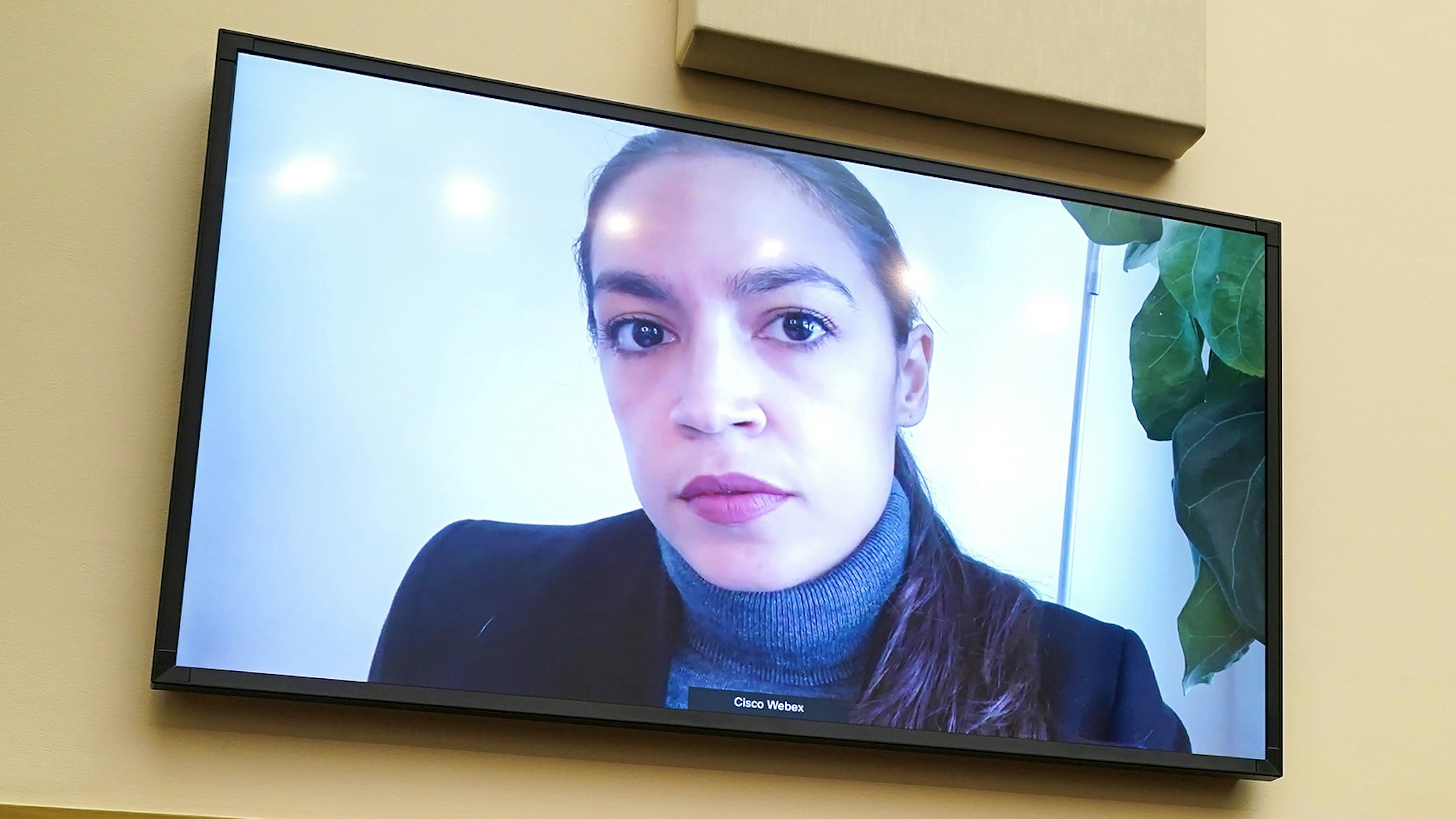 Representative Alexandria Ocasio-Cortez, a Democrat from New York, speaks via videoconference during a House Financial Services Committee hearing in Washington, D.C., U.S., on Wednesday, Dec. 2 2020. Powell and Mnuchin both backed more fiscal stimulus to bridge the U.S. economy through the next few months of the pandemic amid promise for Covid-19 vaccines.