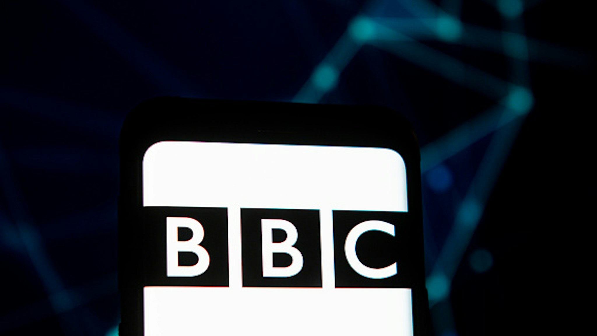 POLAND - 2020/03/23: In this photo illustration a BBC logo seen displayed on a smartphone.