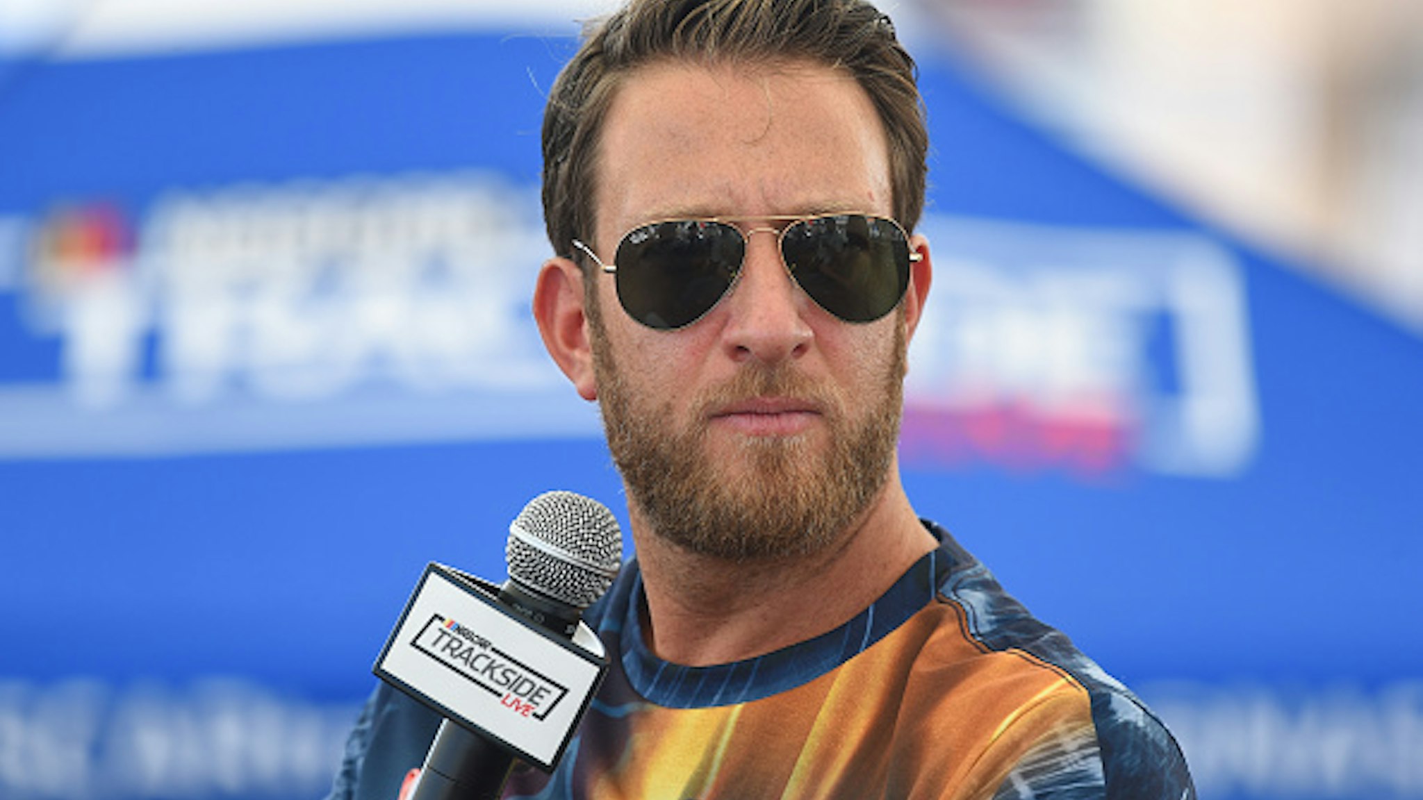 LAS VEGAS, NV - SEPTEMBER 15: David Portnoy, founder of Barstool Sports, is interviewed at the Trackside Live Stage in the LVMS Neon Garage before the South Point 400 Monster Energy NASCAR Cup Series playoff race on September 15, 2019, at Las Vegas Motor Speedway in Las Vegas, NV.