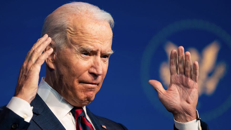US-VOTE-POLITICS-BIDEN US President-elect Joe Biden speaks during an event to introduce key Cabinet nominees and members of his climate team at The Queen Theater in Wilmington, Delaware on December 19, 2020.