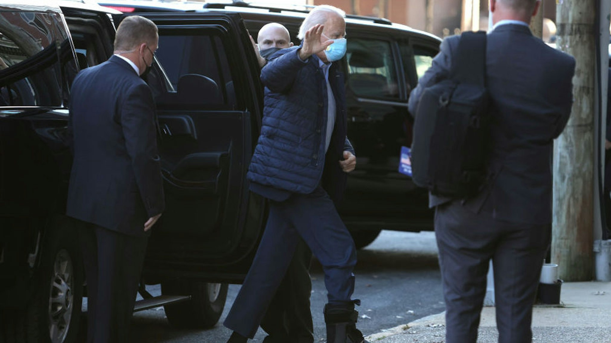 WILMINGTON, DELAWARE - DECEMBER 02: U.S. President-elect Joe Biden waves as he arrives for a virtual roundtable with workers and small business owners at The Queen Theatre on December 2, 2020 in Wilmington, Delaware. President-elect Biden held the meeting to discuss with workers and small business owners impacted by the economic crisis.