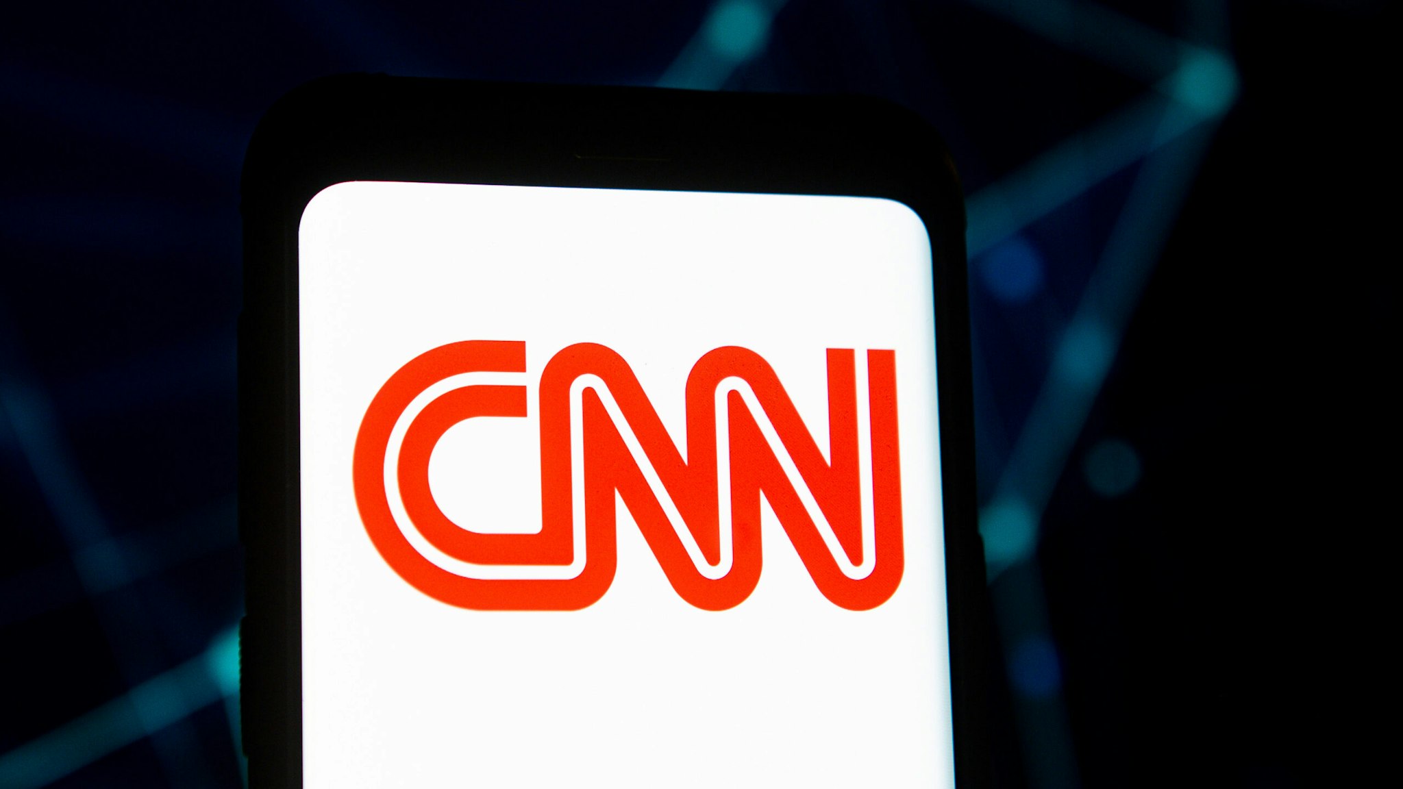 POLAND - 2020/03/23: In this photo illustration a CNN logo seen displayed on a smartphone.