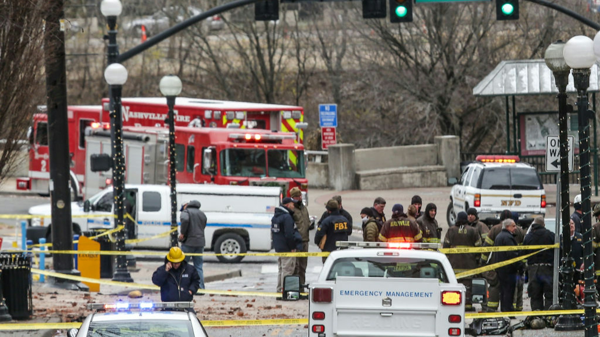NASHVILLE, TN - DECEMBER 25: FBI and first responders work on the scene after an explosion on December 25, 2020 in Nashville, Tennessee. According to initial reports, a vehicle exploded downtown in the early morning hours