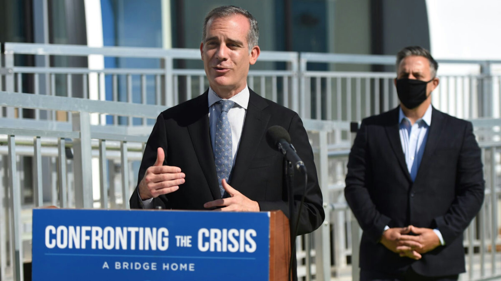 Los Angeles Mayor Eric Garcetti speaks to those gathered for the official opening of the City"u2019s 16th A Bridge Home shelter which will house 100 adults experiencing homelessness in San Pedro on Monday, July 6, 2020.