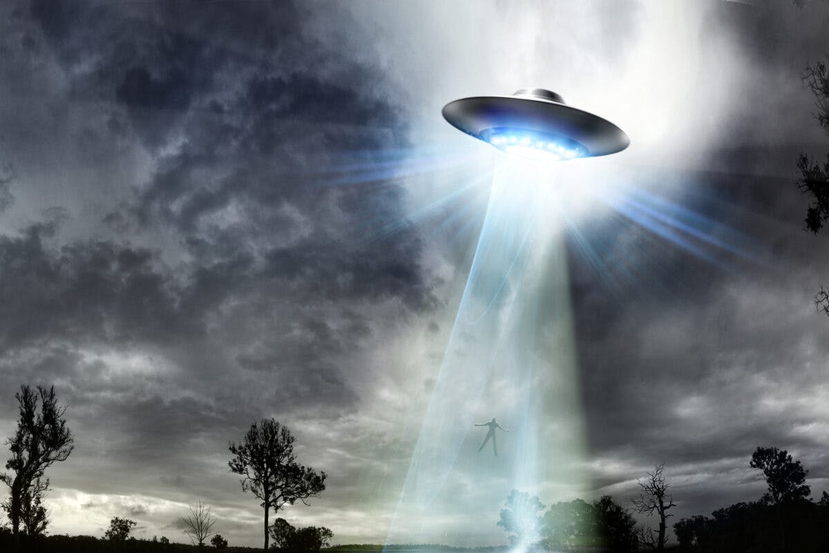 UFO Beaming up a Man