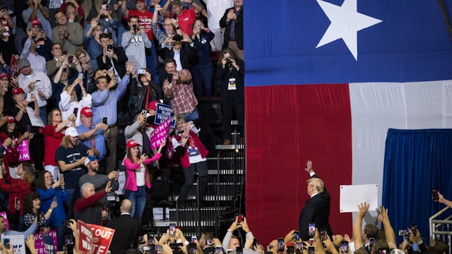 HOUSTON, TX - OCTOBER 22: U.S. President Donald Trump takes the stage for a rally in support of Sen. Ted Cruz (R-TX) on October 22, 2018 at the Toyota Center in Houston, Texas. Cruz, the incumbent, is seeking Senate re-election in a high-profile race against Democratic challenger Beto O'Rourke. (Photo by Loren Elliott/Getty Images)