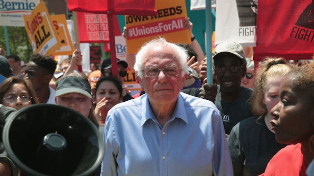CEDAR RAPIDS, IOWA - JUNE 09: Democratic presidential candidate Senator Bernie Sanders (I-VT) sarrive at the Iowa Democratic Party's Hall of Fame Dinner marching with Fight For $15 fast food workers on June 9, 2019 in Cedar Rapids, Iowa. Nearly all of the 23 Democratic candidates running for president were campaigning in Iowa this weekend. President Donald Trump has two events scheduled in the state on Tuesday. (Photo by Scott Olson/Getty Images)