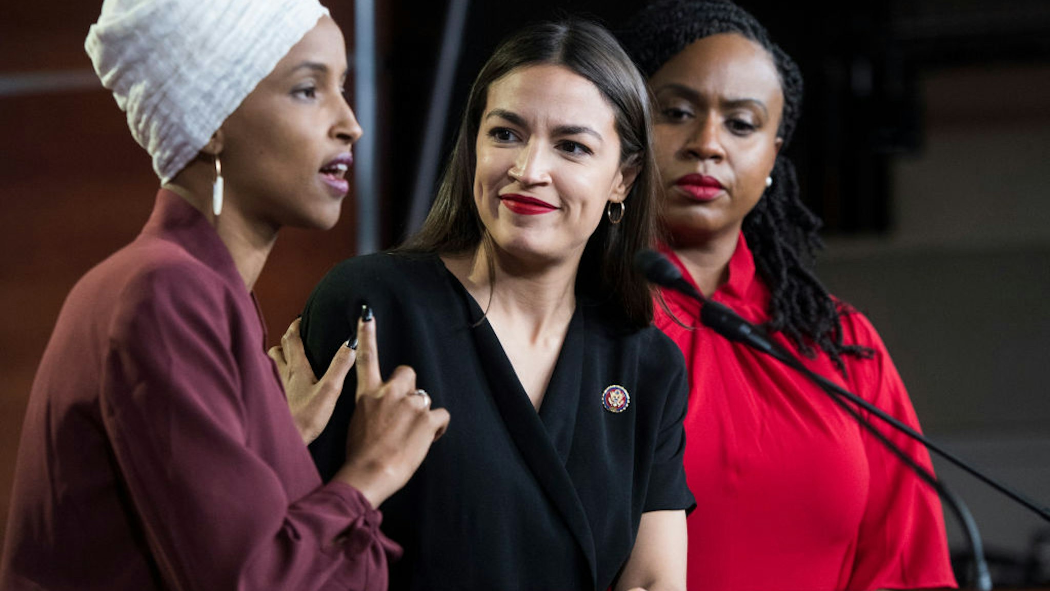 From left, Reps. Ilhan Omar, D-Minn., Alexandria Ocasio-Cortez, D-N.Y., and Ayanna Pressley, D-Mass., conduct a news conference in the Capitol Visitor Center responding to negative comments by President Trump that were directed at the freshmen House Democrats on Monday, July 15, 2019.